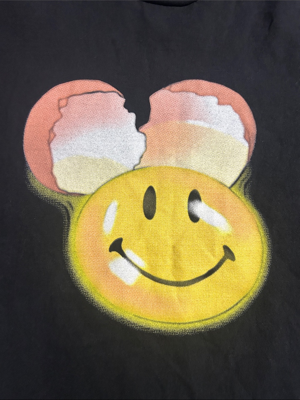 Market The Smiley co. black T-shirt with cracked egg and smile